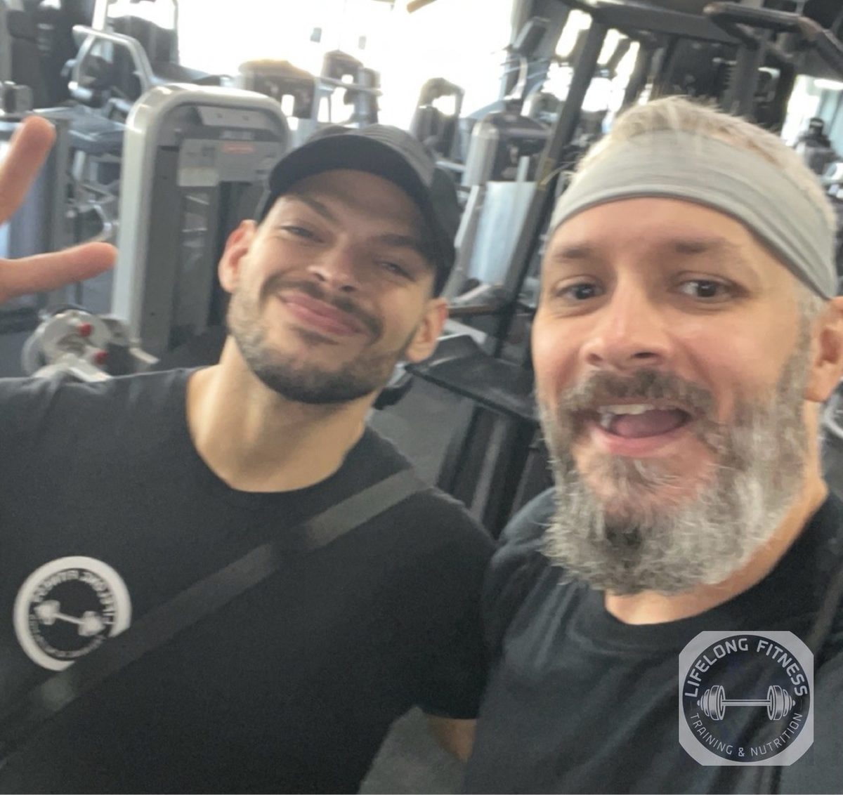 Coach Ozzy selfie with client at Rise Gym
